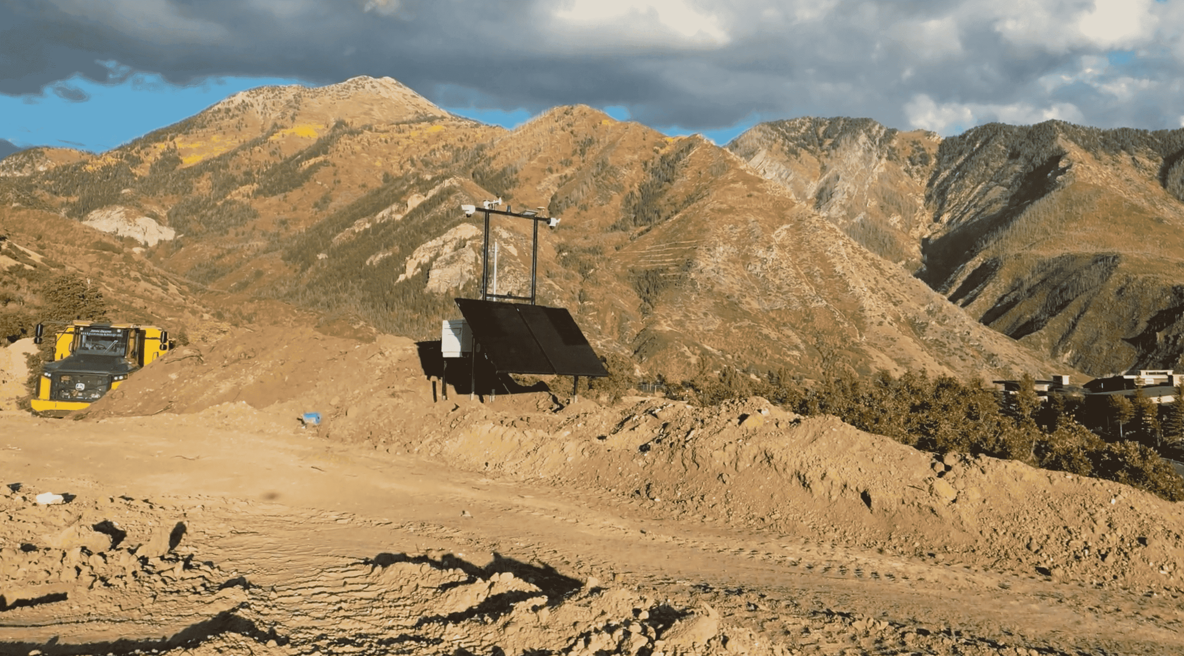 Construction site security cameras mounted on solar-powered mobile surveillance trailer protecting job site equipment