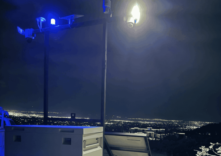 Mobile surveillance trailer rental cost breakdown showing solar-powered unit deployed on a job site